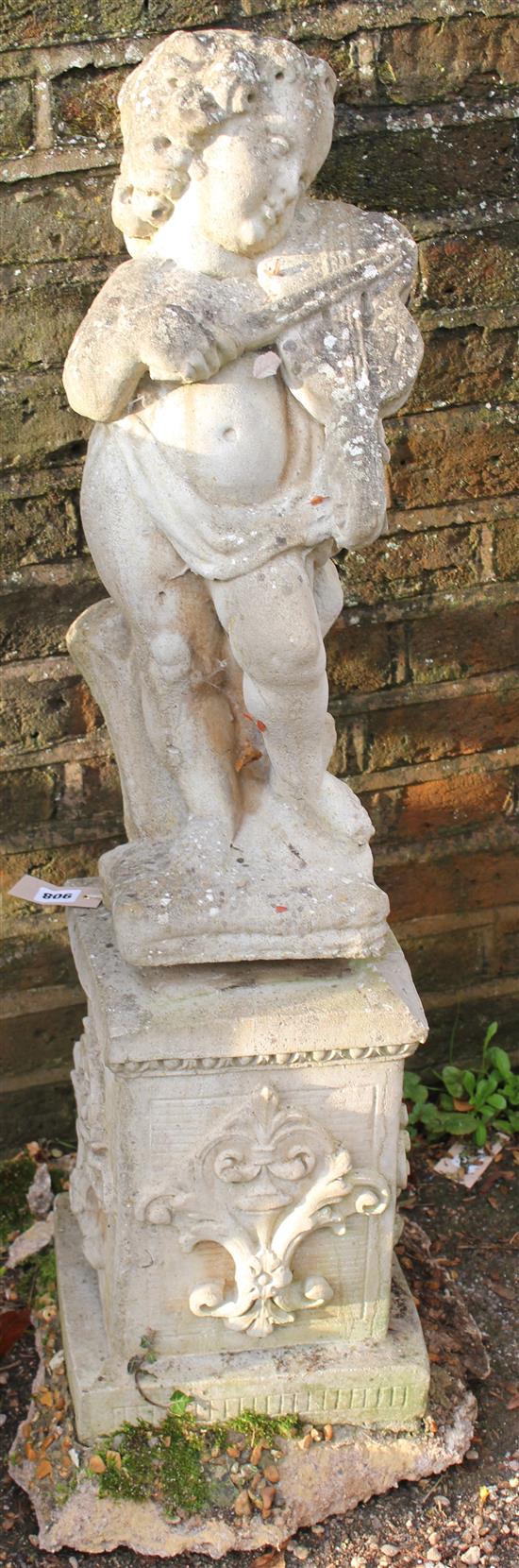 Small stonework figure of a child with a violin(-)